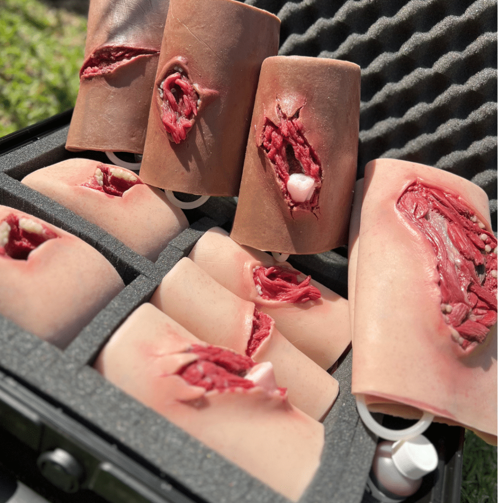 An open case that displays various types of wound simulators on offer from Battlefield Partners